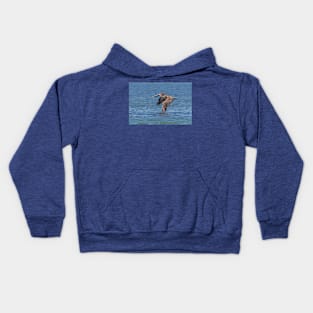 Flying Brown Pelican Touches Water with Wing Kids Hoodie